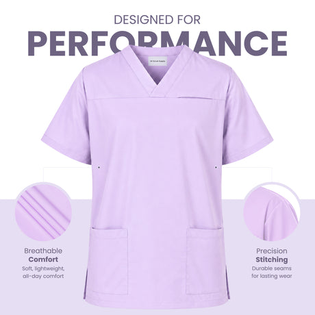 Uk Scrub Suppky A light purple scrub top displayed on a white background with marketing text reading 'DESIGNED FOR PERFORMANCE' and feature callouts for breathability and precision stitching.