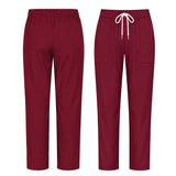 Uk Scrub Supply Front and back views of burgundy scrub pants with an elastic waistband, white drawstring, and side pockets on a plain white background.