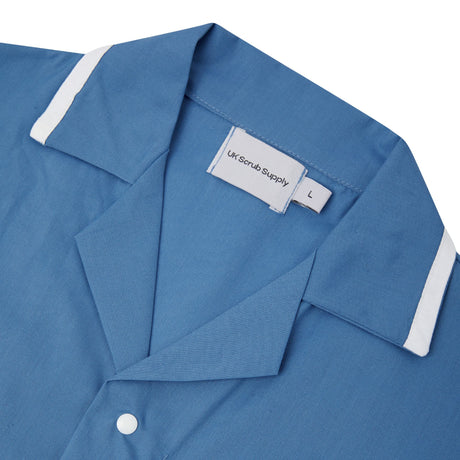 Blue scrub shirt with label on a white background