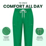 Uk Scrub Supply Green drawstring pants centered on a white background with marketing text reading 'TIE ONCE COMFORT ALL DAY' and two circular inset callouts highlighting breathable comfort and adjustable drawstring features.