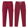 Uk Scrub Supply burgundy color scrub trousers Front and back views of burgundy scrub pants with cargo pockets and an elastic drawstring waist, shown on a plain white background.