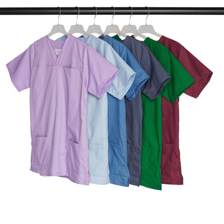 Row of colorful scrub tops on hangers.